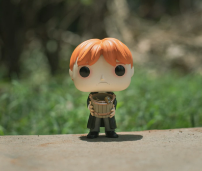 Funko Pop! Harry Potter: Ron Puking Slugs with Bucket - filmspullen.nl